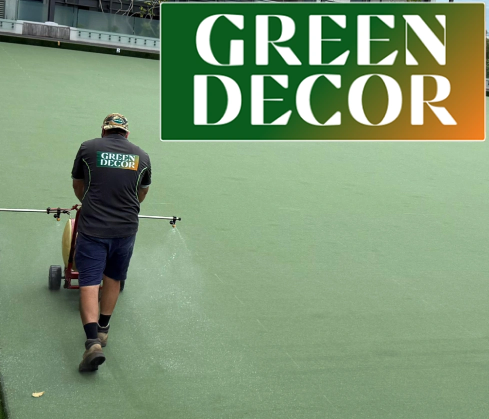 Green Decor team member with lawn care equipment